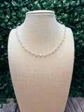 Aquamarine faceted rondelles on a vermeil hand wrapped chain.