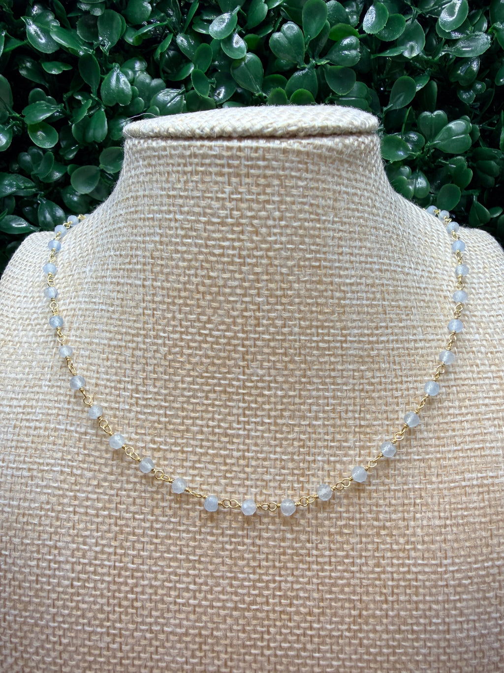 Aquamarine faceted rondelles on a vermeil hand wrapped chain.