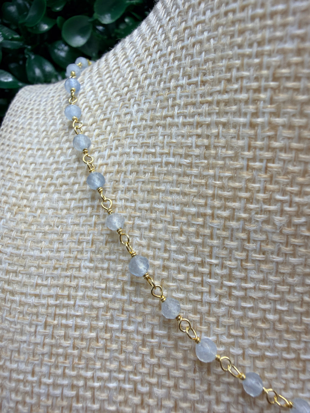Aquamarine faceted rondelles on a vermeil hand wrapped chain.