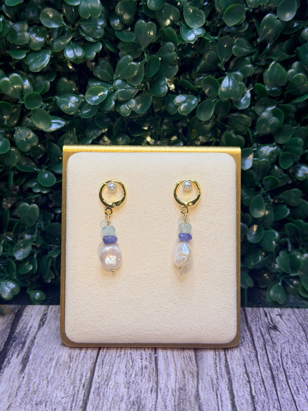 Freshwater coin pearls, lavender tanzanite, and light blue aquamarine gemstones