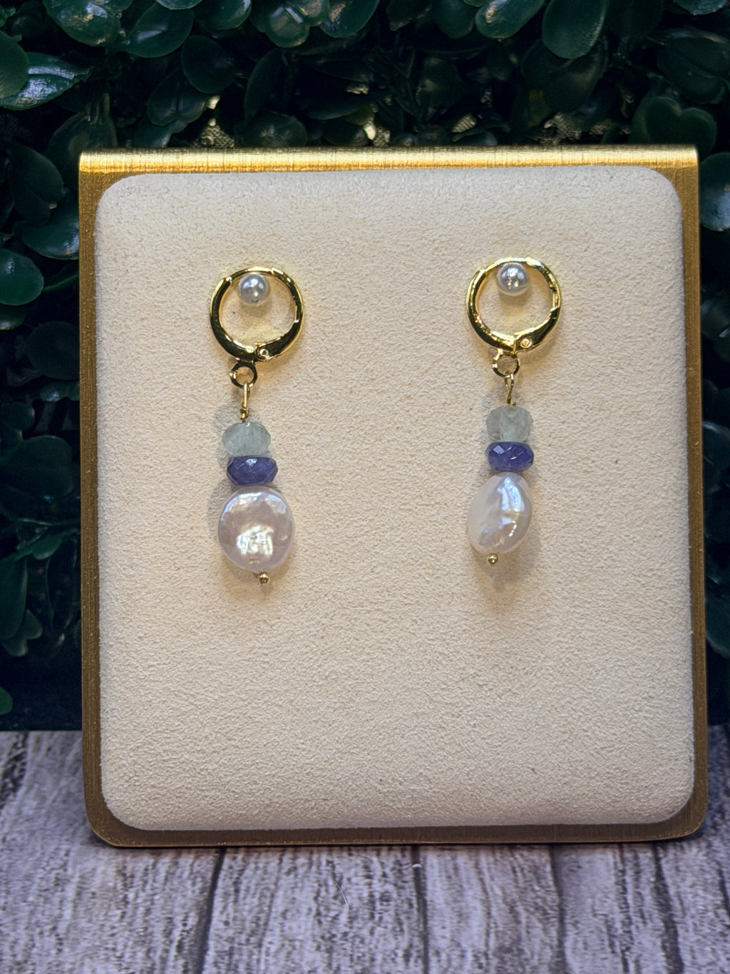 Freshwater coin pearls, lavender tanzanite, and light blue aquamarine gemstones