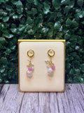 Pink baroque pearl drop earring with a cluster of pink jades and seed pearls