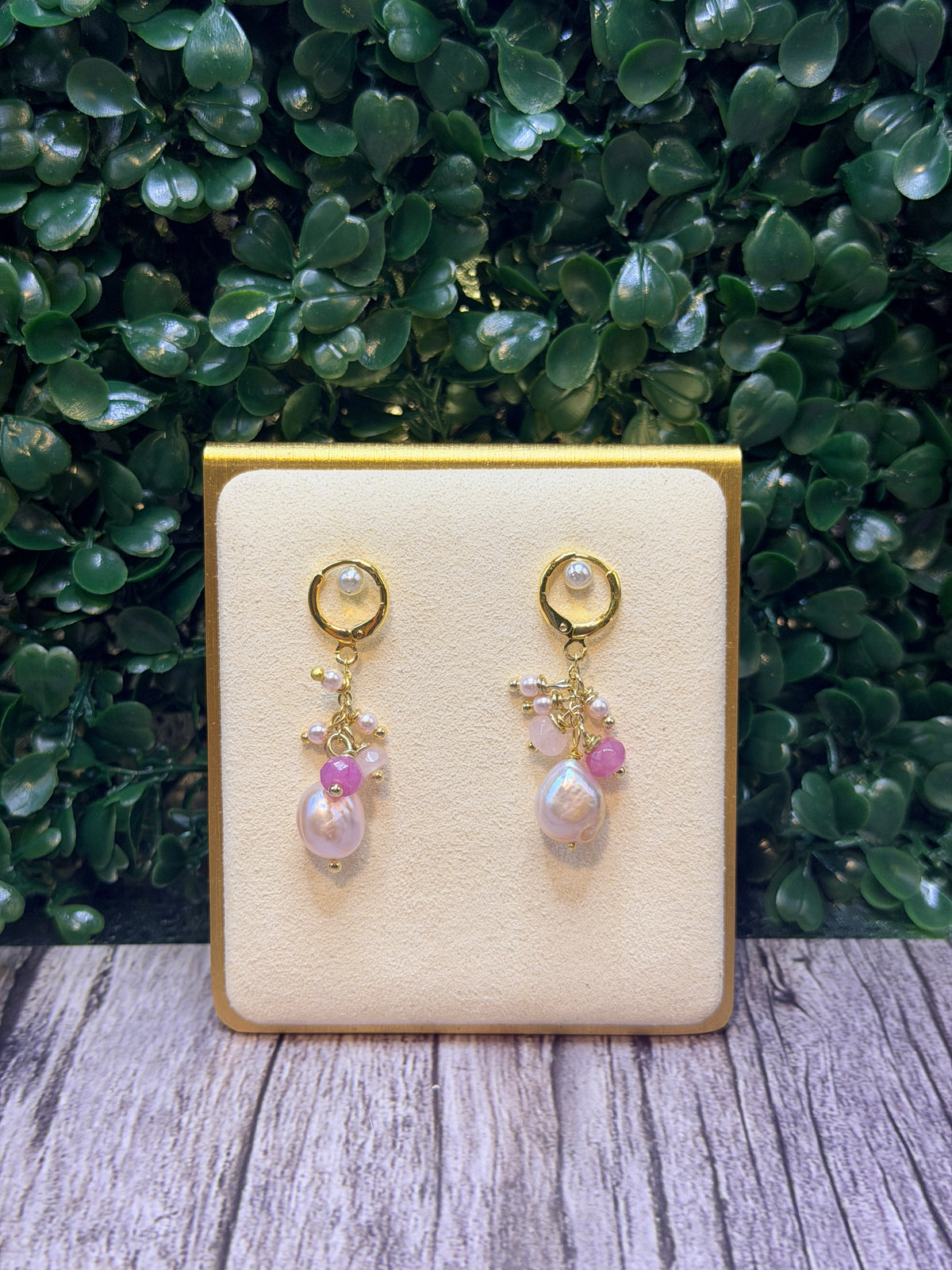 Pink baroque pearl drop earring with a cluster of pink jades and seed pearls
