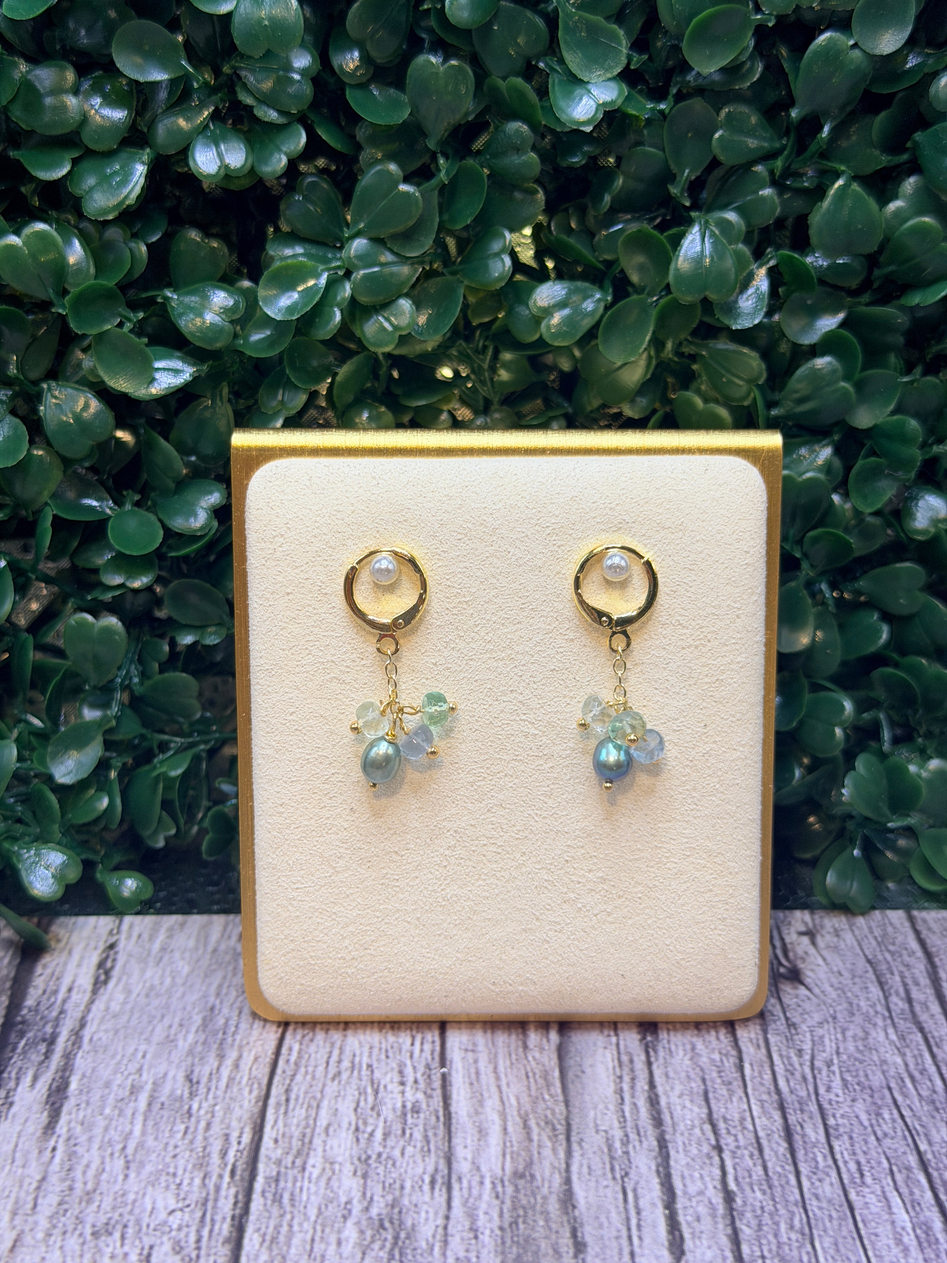 Peacock green freshwater pearls and a cluster of multi-colored fluorite gemstones earrings