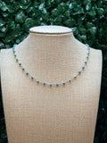 Turquiose faceted rondelles on a vermeil hand wrapped chain.