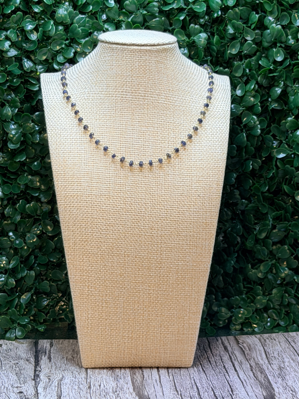Iolite faceted rondelles on a vermeil hand wrapped chain.