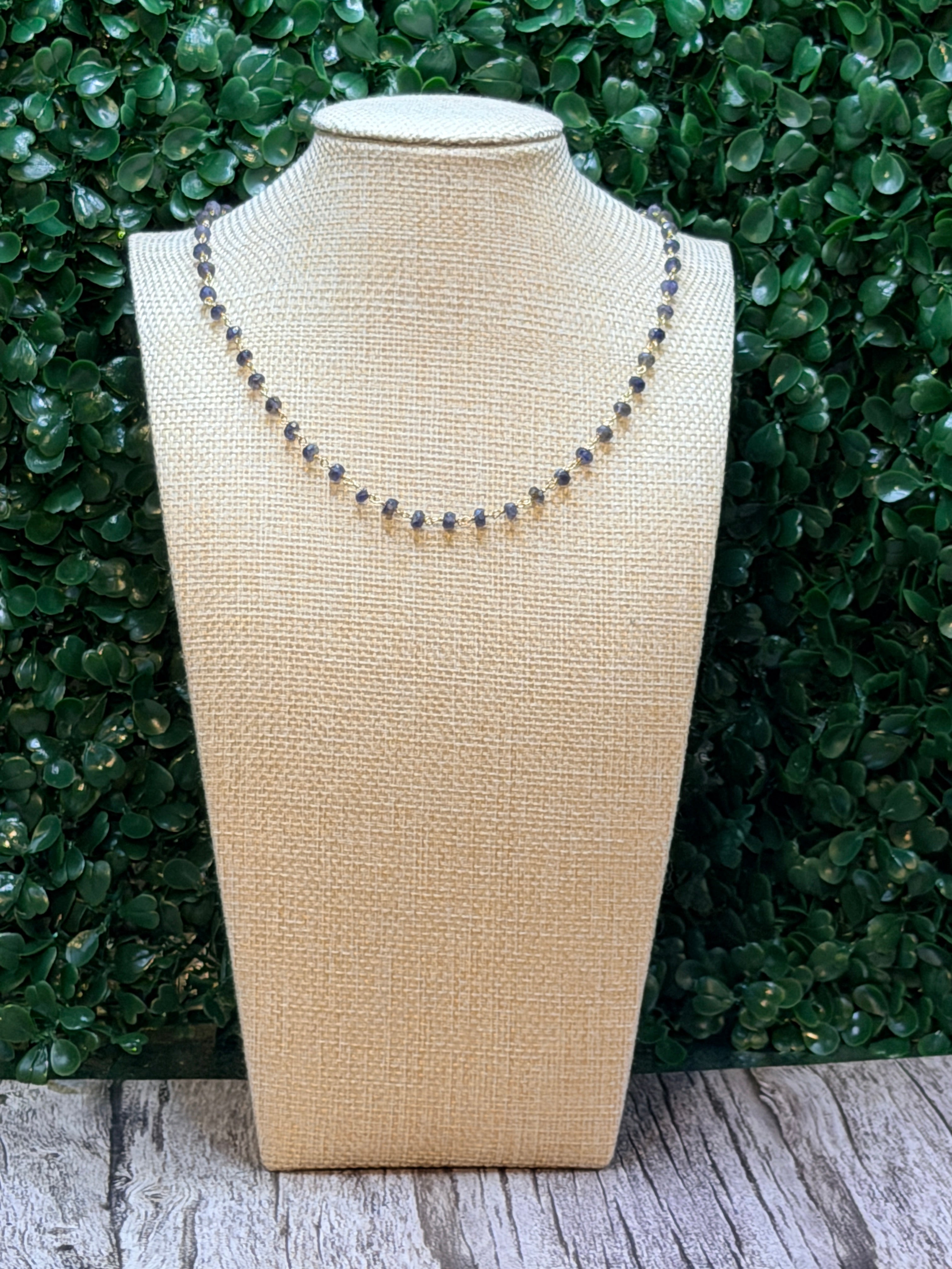 Iolite faceted rondelles on a vermeil hand wrapped chain.