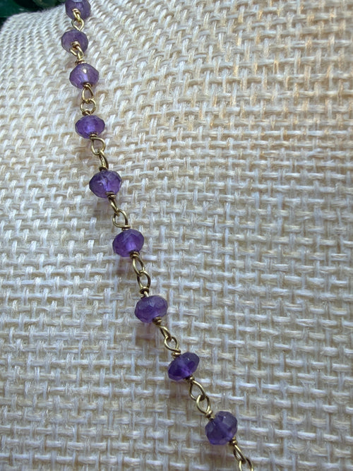 Amethyst faceted rondelles on a vermeil hand wrapped chain.