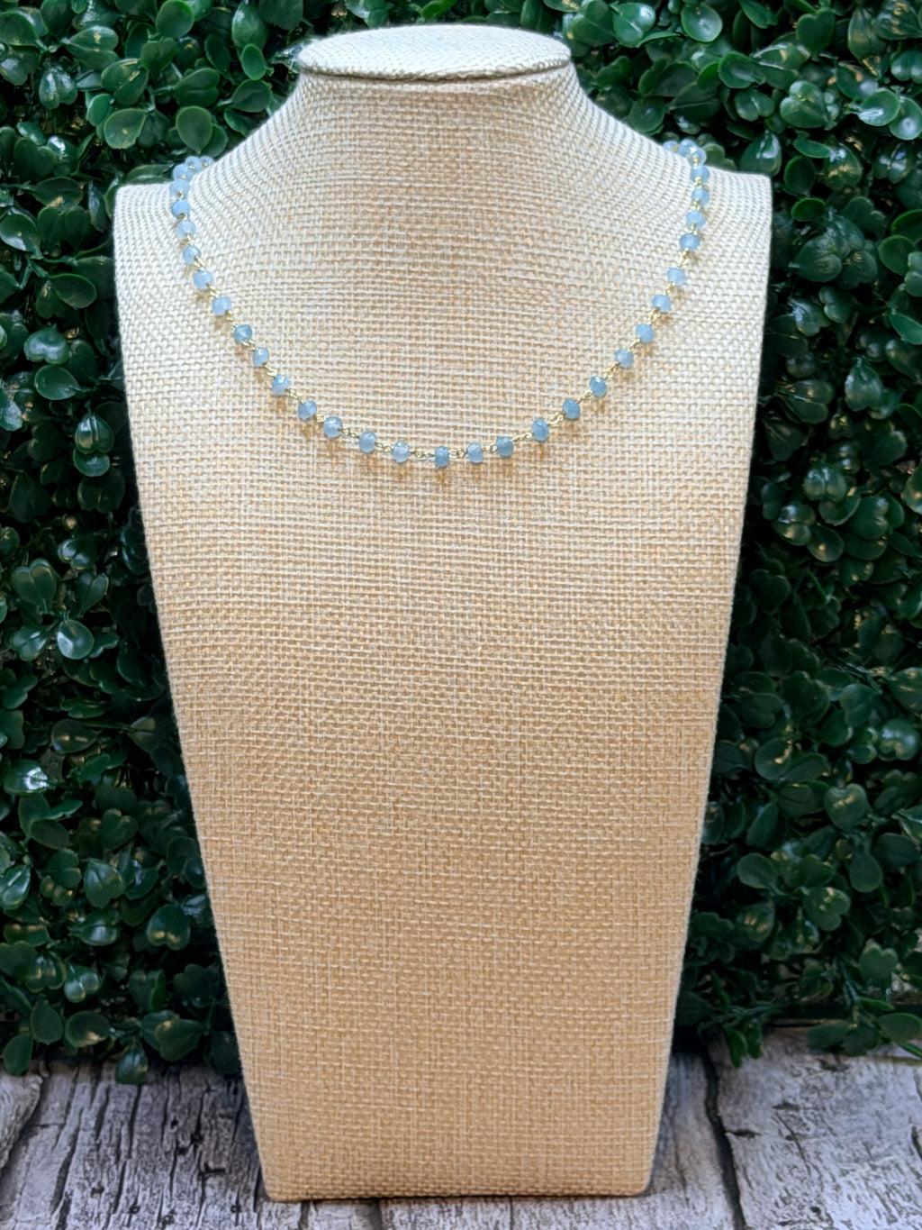 Blue chalcedony faceted rondelles on a vermeil hand wrapped chain.