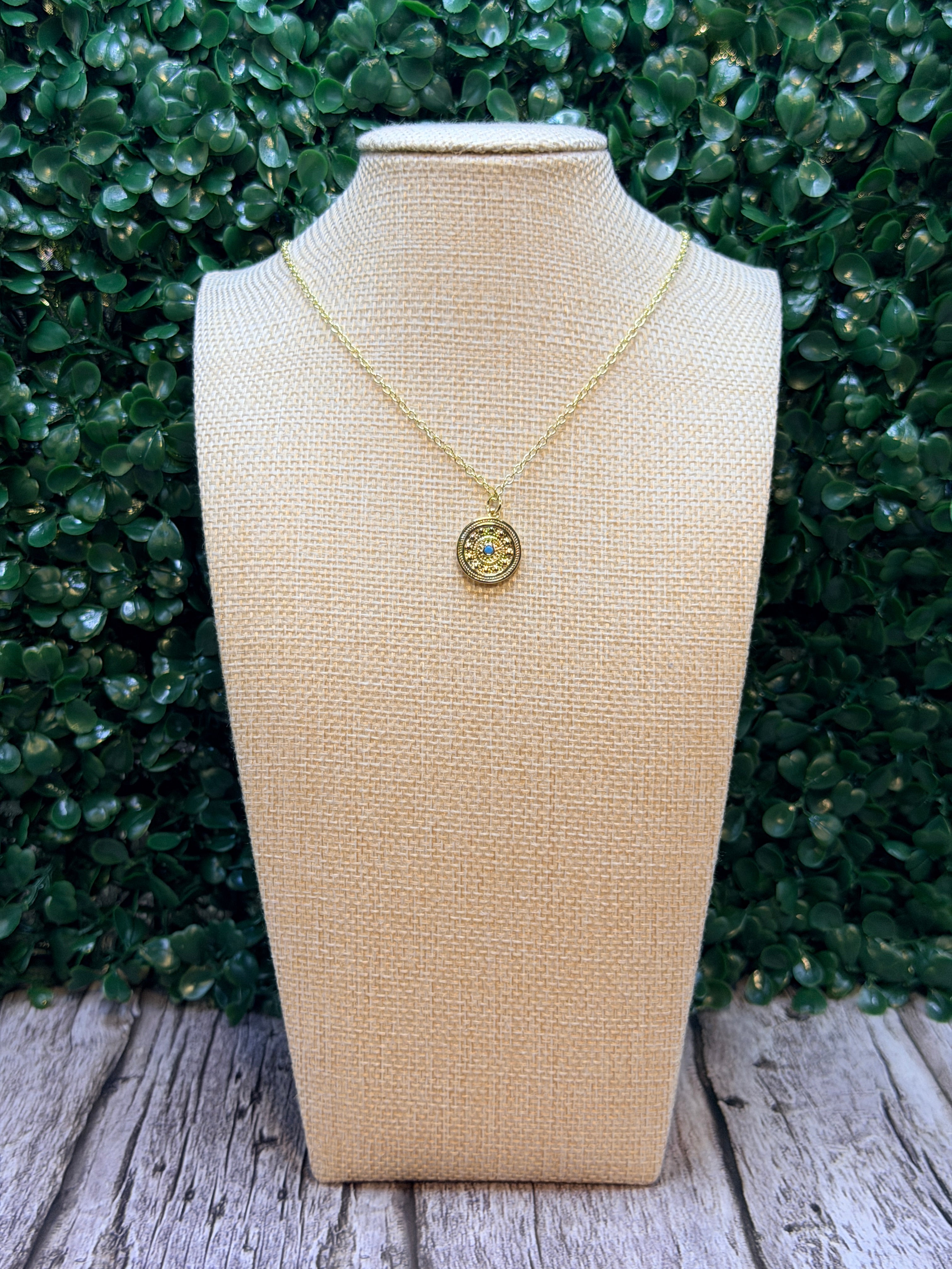 Gold and turquoise disc pendant necklace