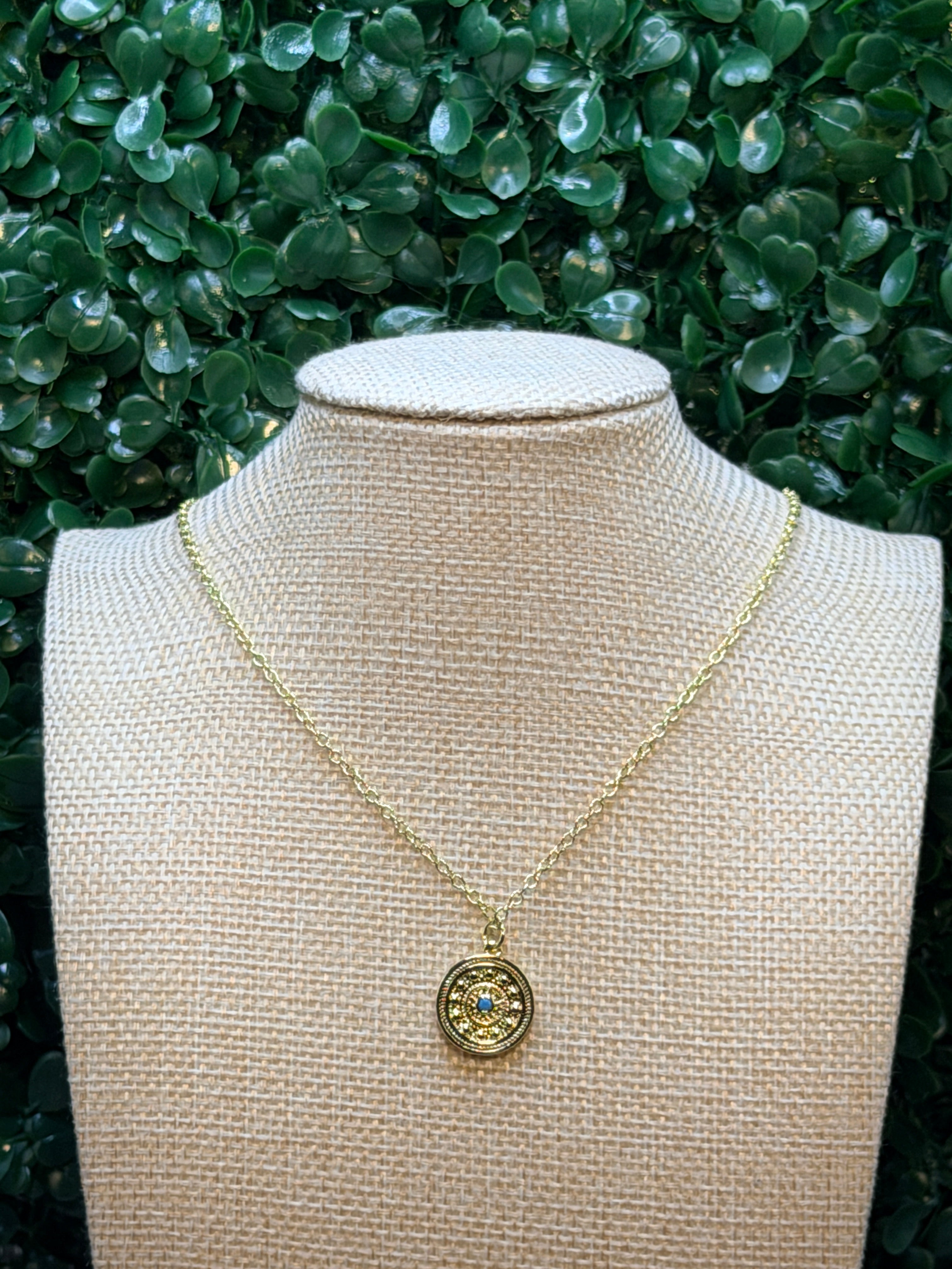 Gold and turquoise disc pendant necklace