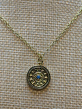 Gold and turquoise disc pendant necklace