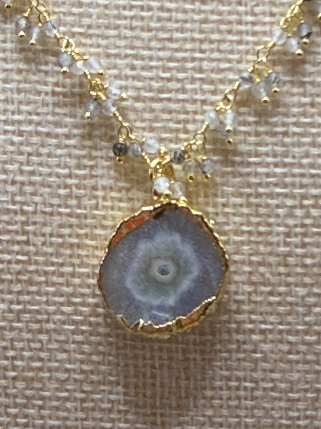 Rutilated cluster rosary necklace with solar quartz geode slice pendant