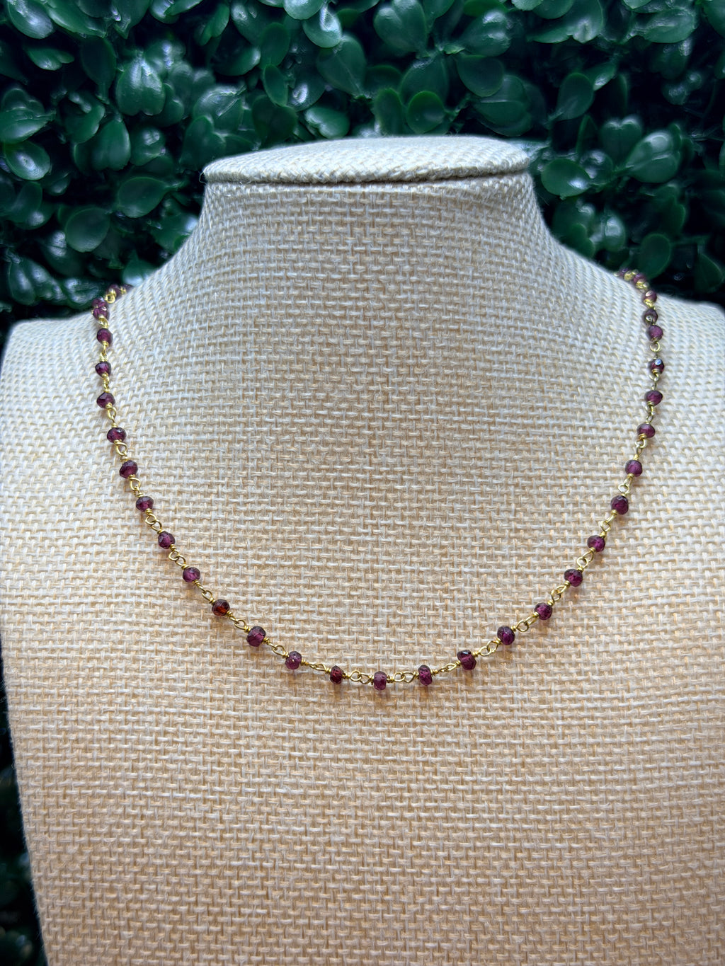 Garnet faceted rondelles on a vermeil hand wrapped chain.