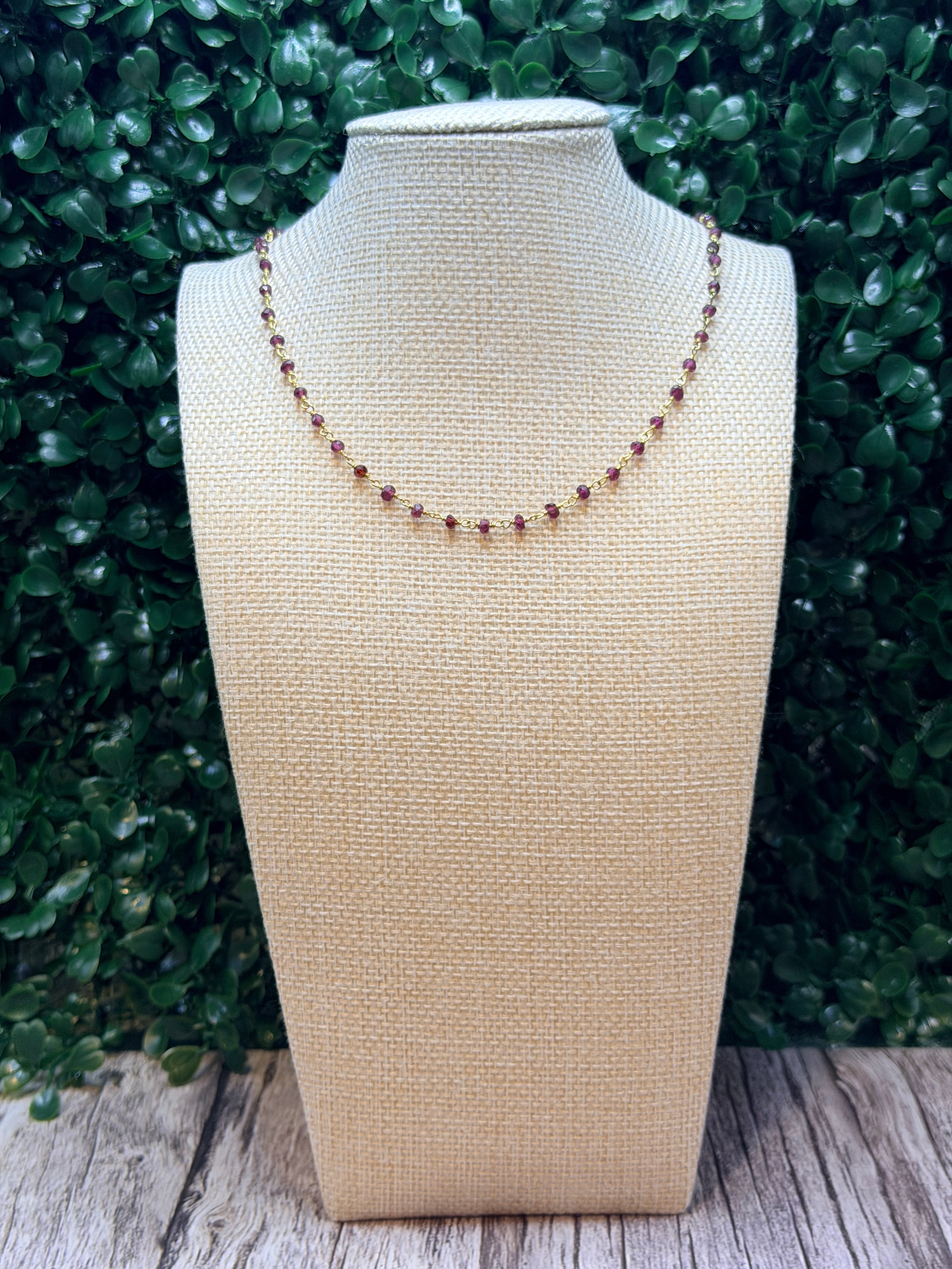 Garnet faceted rondelles on a vermeil hand wrapped chain.